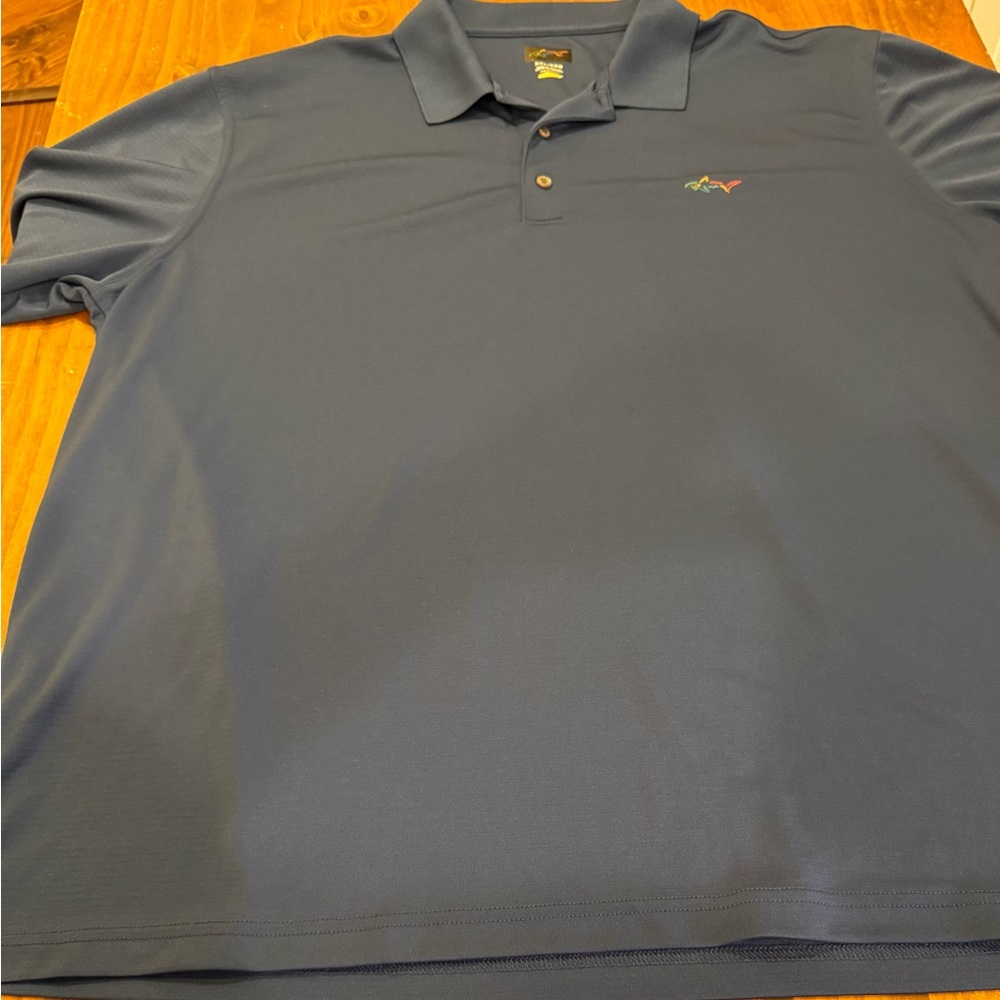 Greg Norman Collection Navy Polo with Multicolor Shark Logo